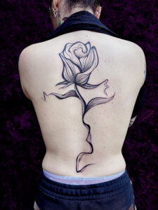large full scale blackwork abstract rose tattoo on a back