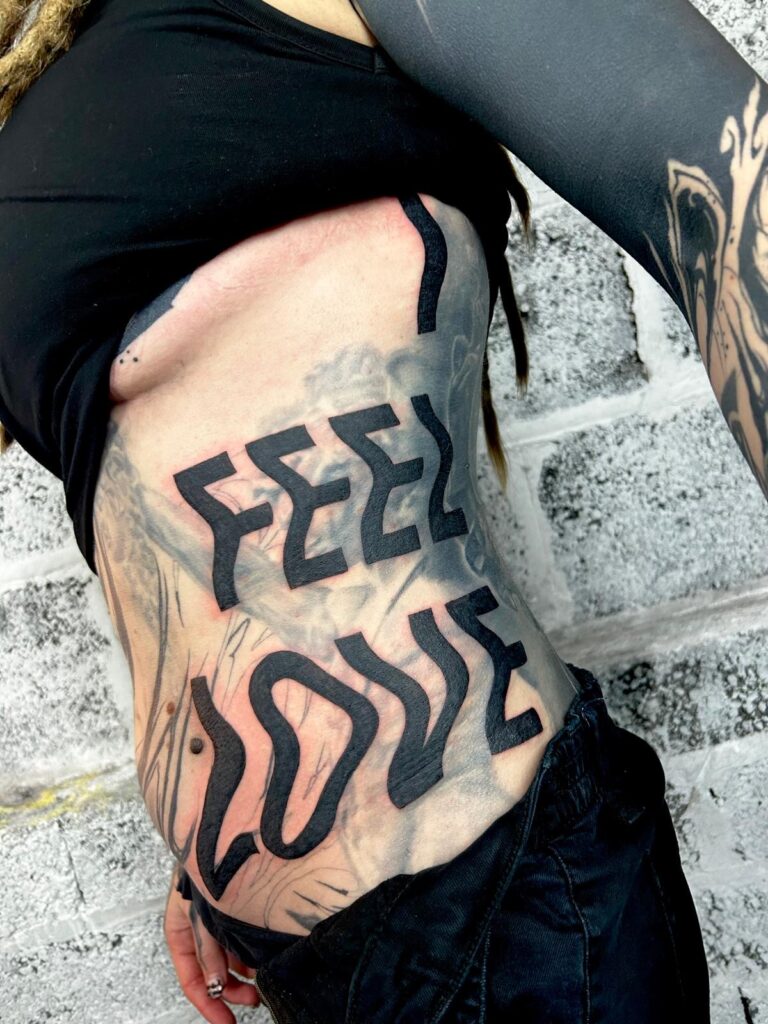 Walk in tattoo at Shallows Studio. large scale blackwork blastover